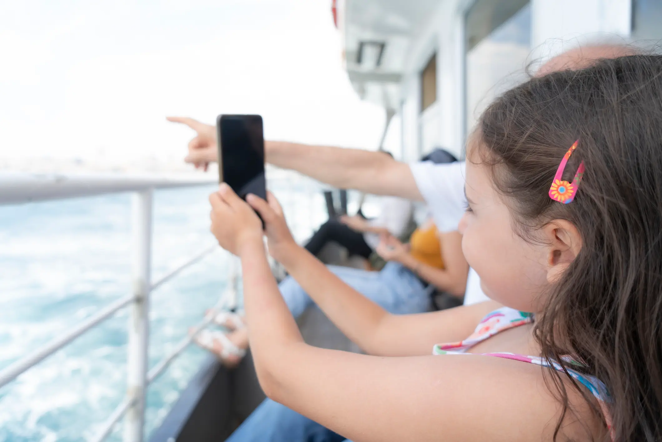 child taking picture during a cruising itinerary
