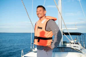 man smiling and buying a yacht from norton yacht