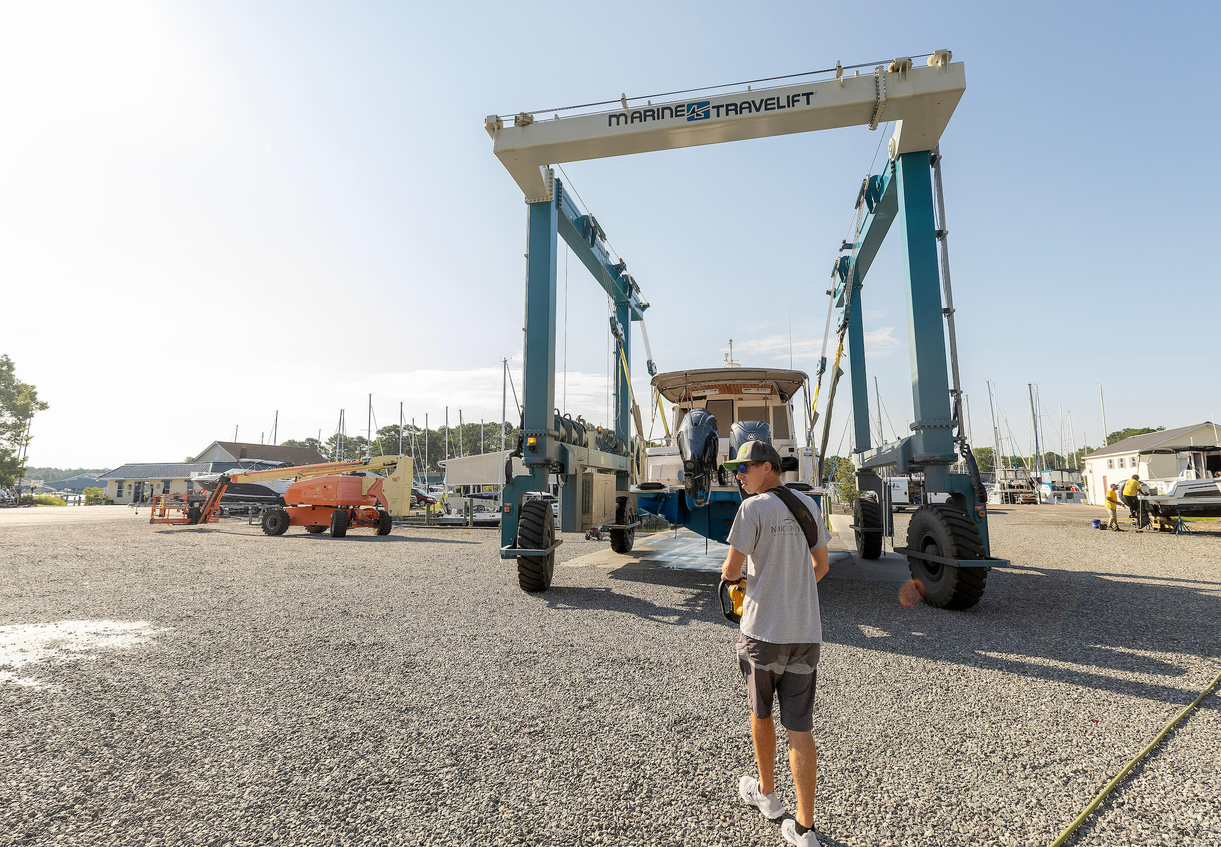 Marine travel lift moving a boat at the Norton Yachts boatyard in Deltaville